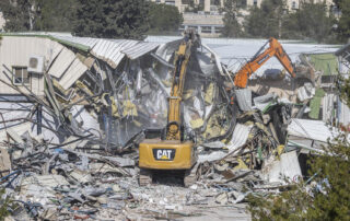 Demolition of UNRWA Headquarters in Al-Quds… A Blow to Memory and Refugees