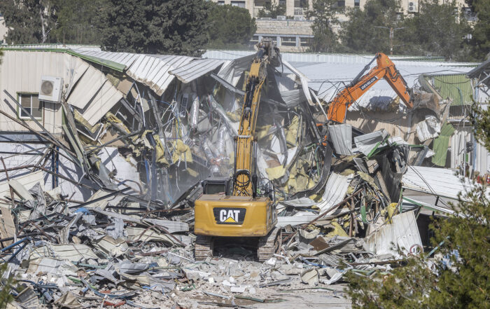 Demolition of UNRWA Headquarters in Al-Quds… A Blow to Memory and Refugees
